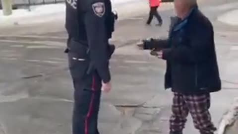 Ottawa Police Officer Arrests Old Man For Supporting Truckers