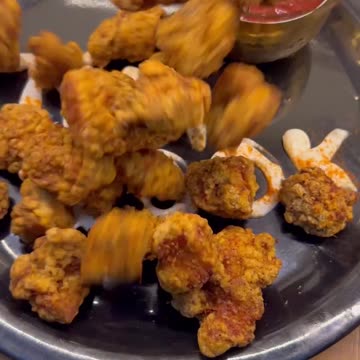"Crunch into Happiness: KFC's Irresistible Chicken Popcorn Delights!"