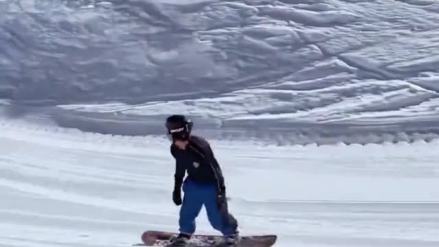 ski boy under snow mountain