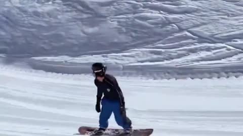 ski boy under snow mountain