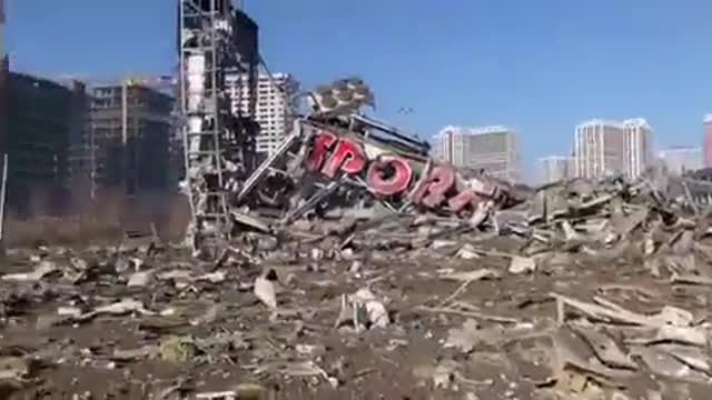 destroyed Retroville shopping mall in Kyiv, following an overnight missile strike.