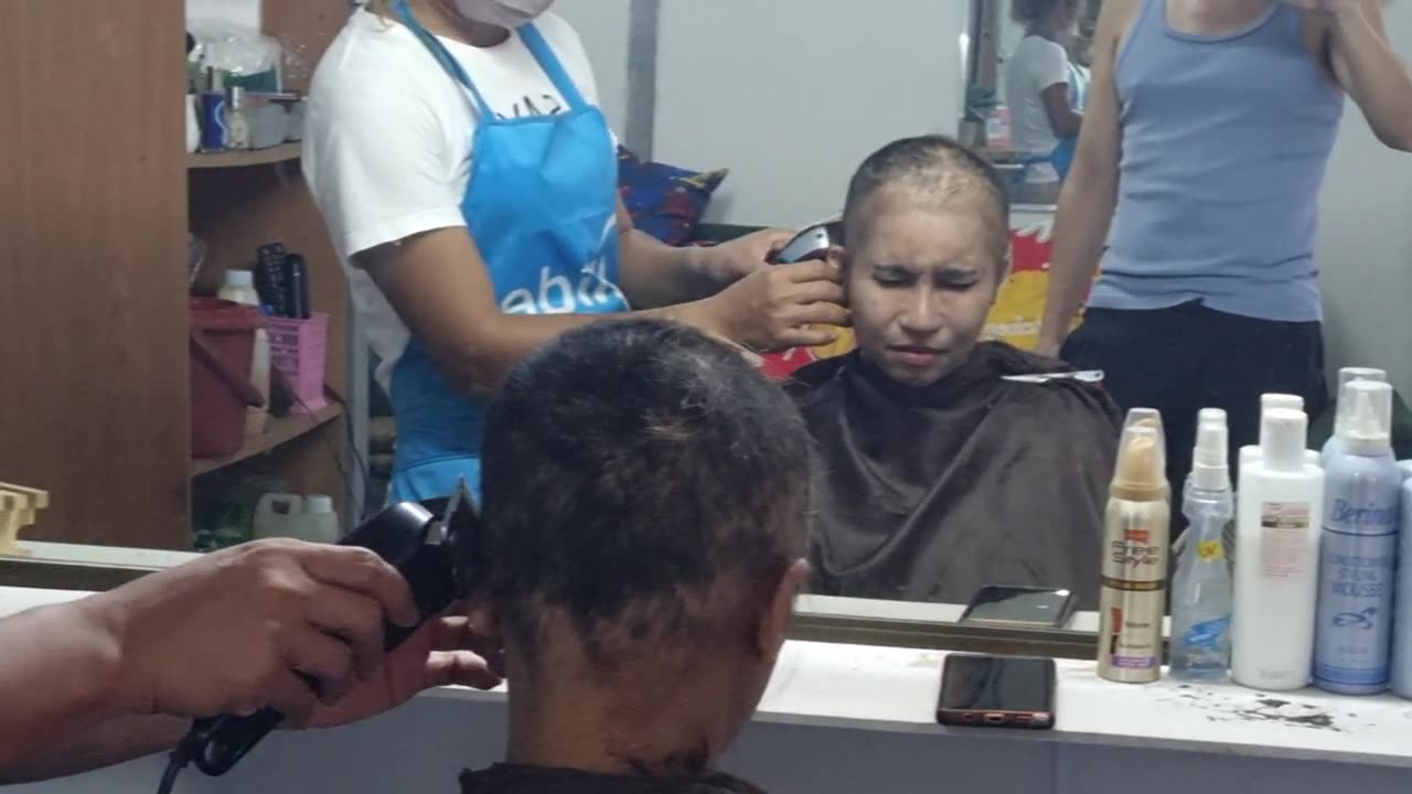 Chinese woman headshave and buzzed