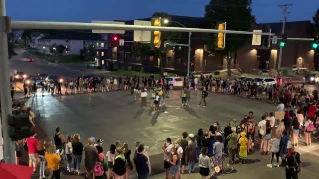 Car Drives Through Protesters Blocking Iowa Intersection