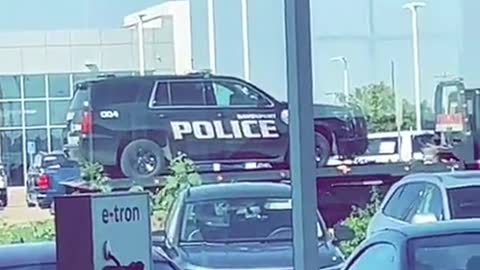 Towing police car