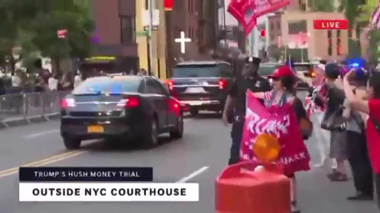 People say "We love Trump" as his motorcade departs the court