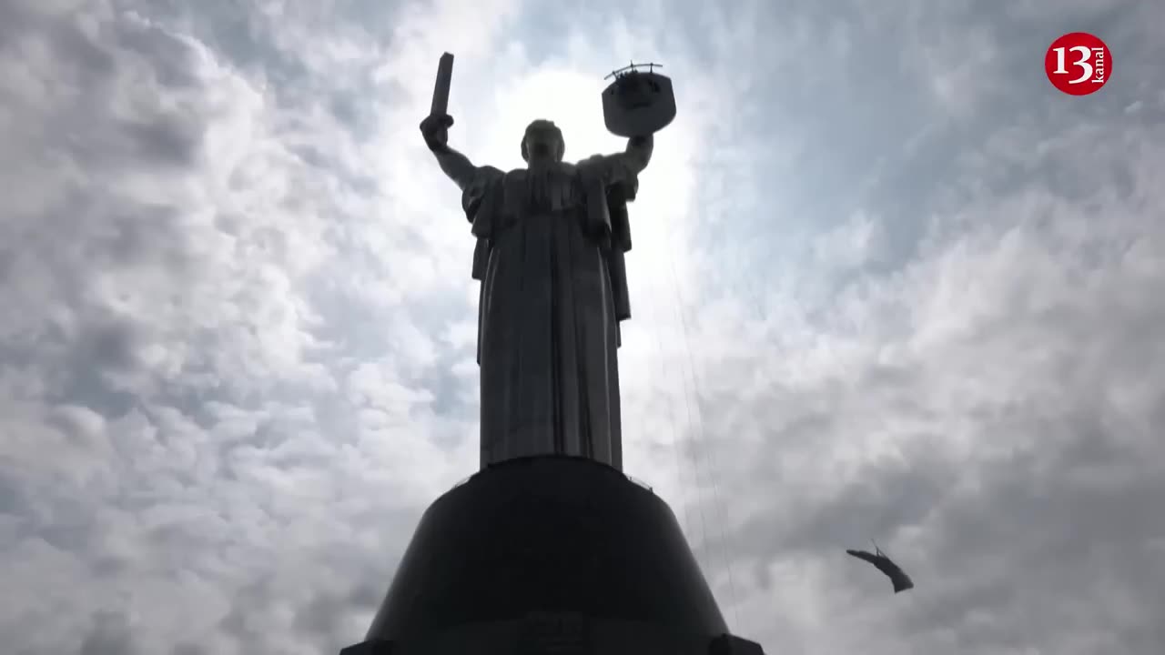 Soviet emblem cut off from Ukraine's Motherland Monument statue