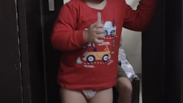 Baby talking with dad