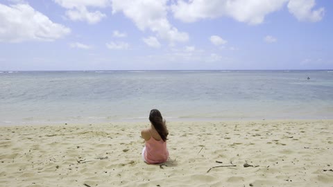 A girl watching the sea