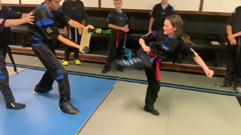 Jessica spin side kick board break