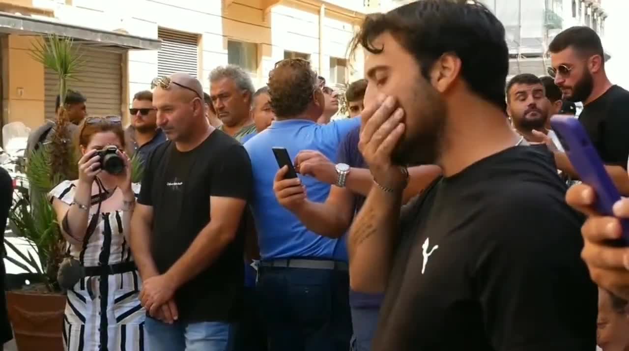 Italian farmers throw the milk in front of the seat of the government in Naples