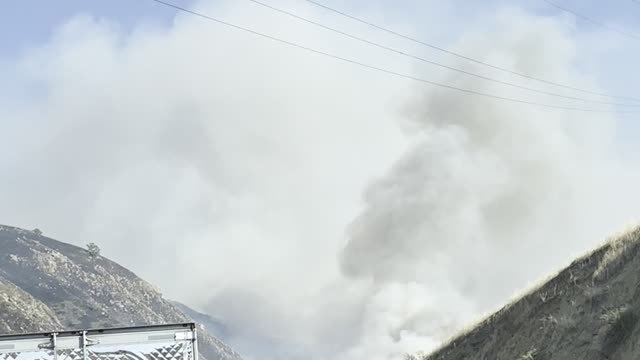 Grapevine Fire Burns Near Cars