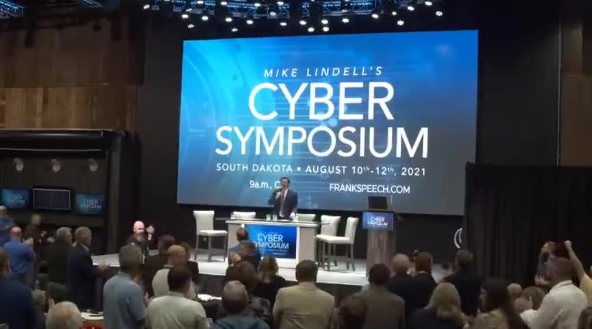 Cyber Symposium Whistleblower's Office Raided While Enroute to Symposium