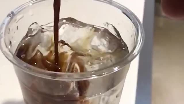 Making the ice Americano (slow motion)