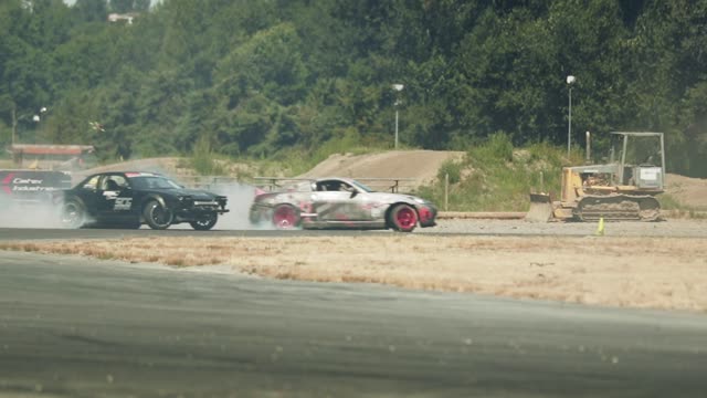 A Drift Car Spinning out at a Racetrack