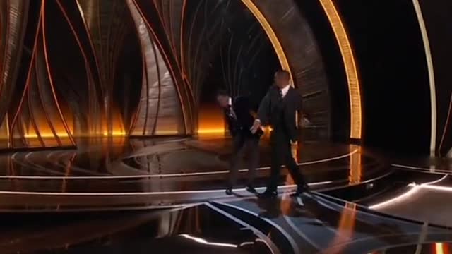 Will Smith slaps Chris Rock on the Oscars stage after making fun of his wife