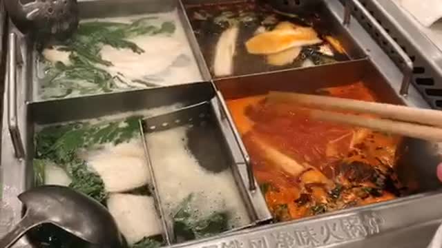 Eating Haidirao Hot Pot