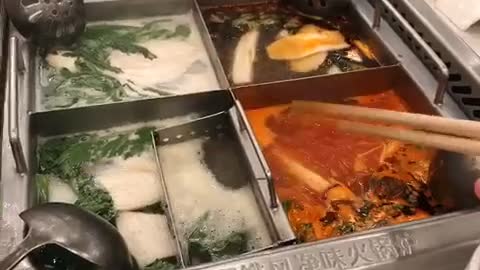 Eating Haidirao Hot Pot