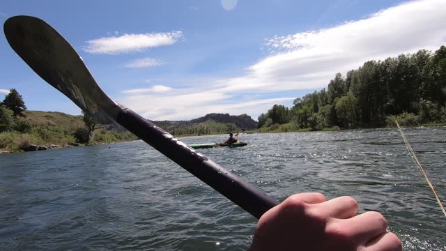 Guy flips kayak in cold river