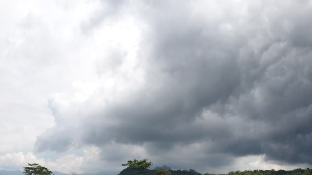 Timelapse activity black clouds on the farm beautiful nature