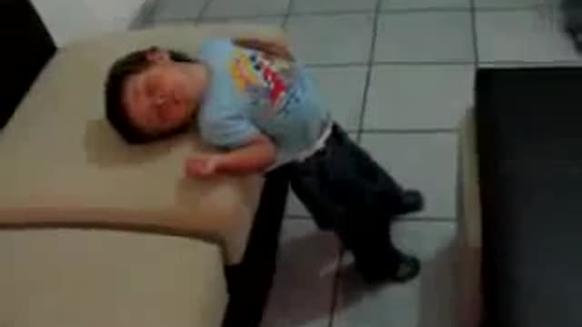 Funny baby wants to sleep