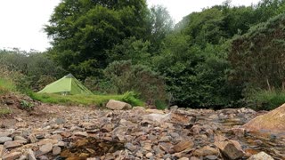 Camping by a river