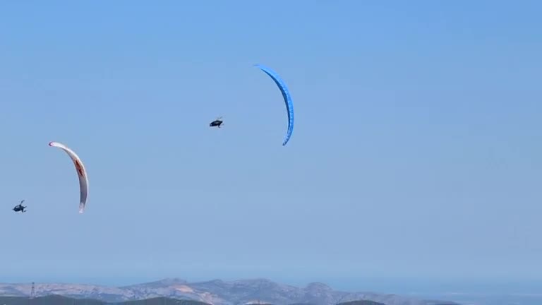 Parachutists jump over historic fortress in southern France