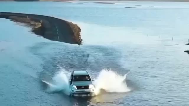 Want to drive across this flooded road in Iceland ???