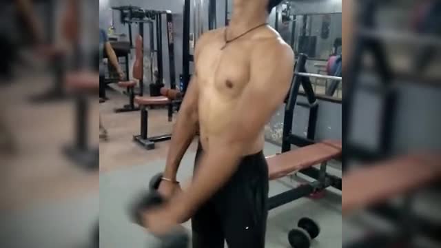 Shoulder workout in the gym and gaining time