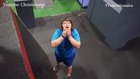 Big kid blue shirt blue shorts falls off tire hits mouth
