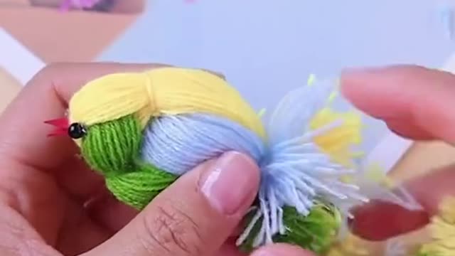 Make a bird out of wool ( handycrafts )