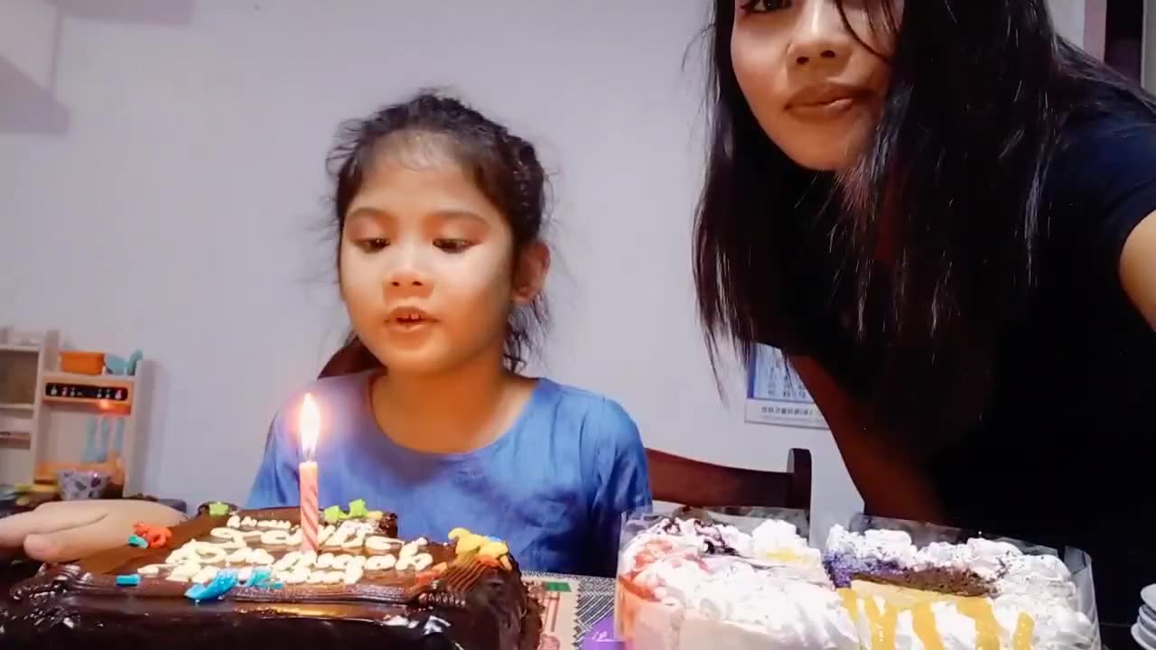 Blowing out the candle with Mommy 🥳🎂🎉👩‍👧❤️