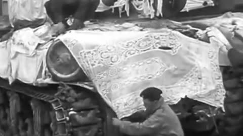 allied troops camouflage their tanks