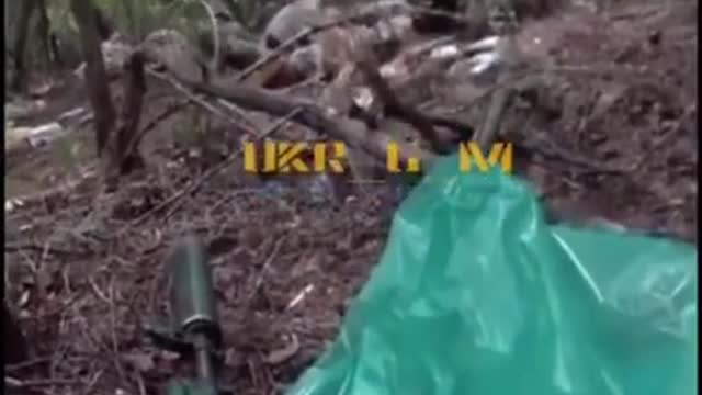 Ukrainian defenders in a firefight