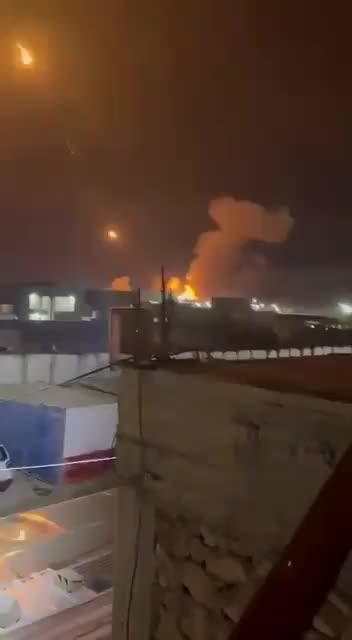 Multiple rockets/munition launching as secondaries from a targeted warehouse in Al-Qaim, Iraq