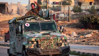 Syrian rebels capture key city of Hama in fresh blow to Assad