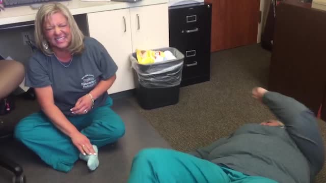 Two Nurses Tumble Down in Stretching Fail