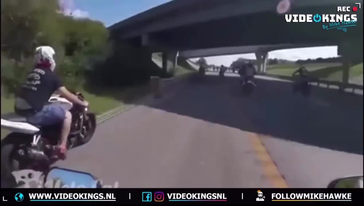 Biker crashes into guardrail