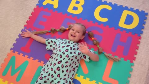 Roma and Diana learn the alphabet