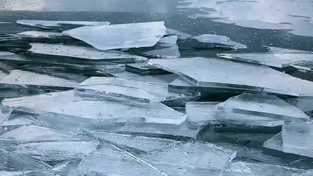 Really satisfying - Ice sheets crashing into shore.