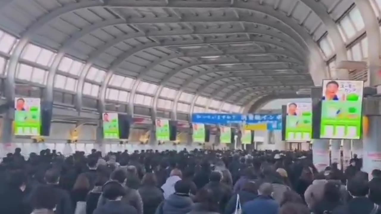 In Japan, commuters stay quiet on trains to keep