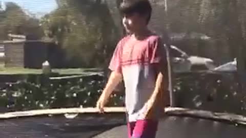 Slowmo kid drops other kid on trampoline