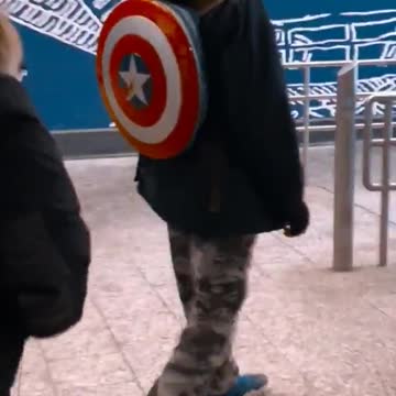 Guy with captain america shield backpack