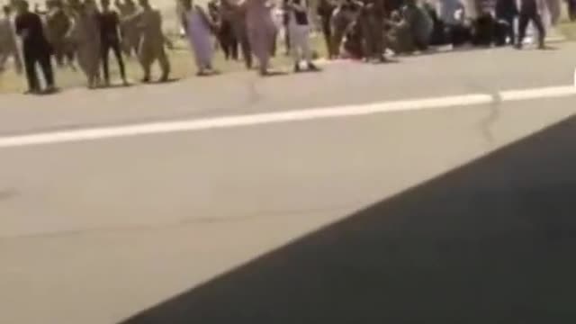 Afganistan. people board the plane