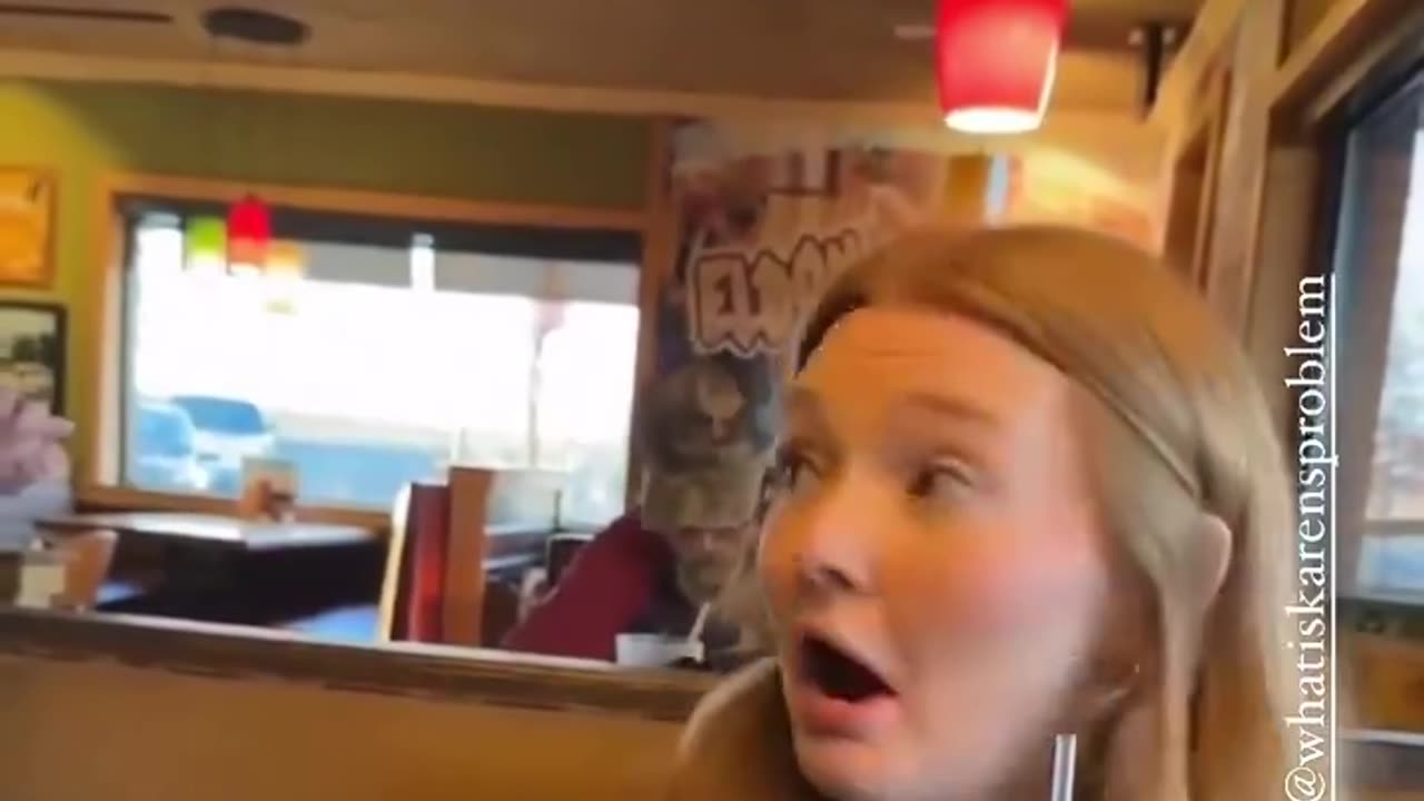 Woman Hissing At Waitress