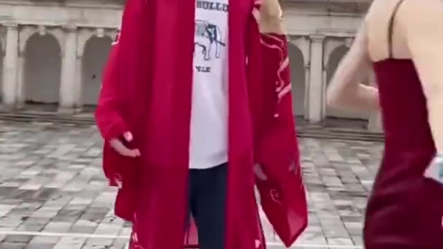 Chinese Woman in Red Dress Dodging Bat (Full Video)