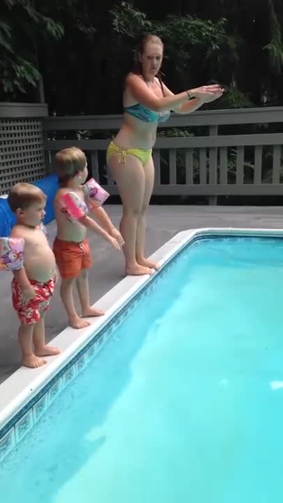 Child Does a Spectacular Belly-Flop into the Pool