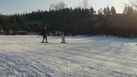 I am skiing with my son