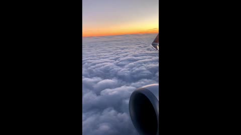 Looking down from high above the white clouds