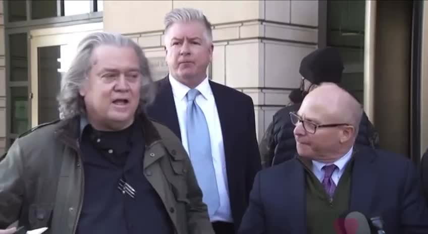 Steve Bannon and his attorneys respond to reporters outside the courthouse.