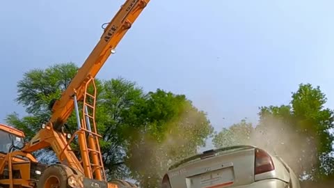 A 5000 kg stone down to a car